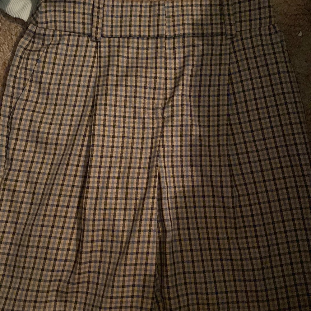 Black blue and tan pleated pants